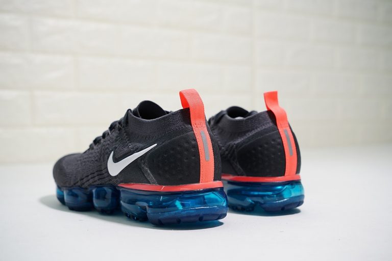 grey orange and blue vapormax