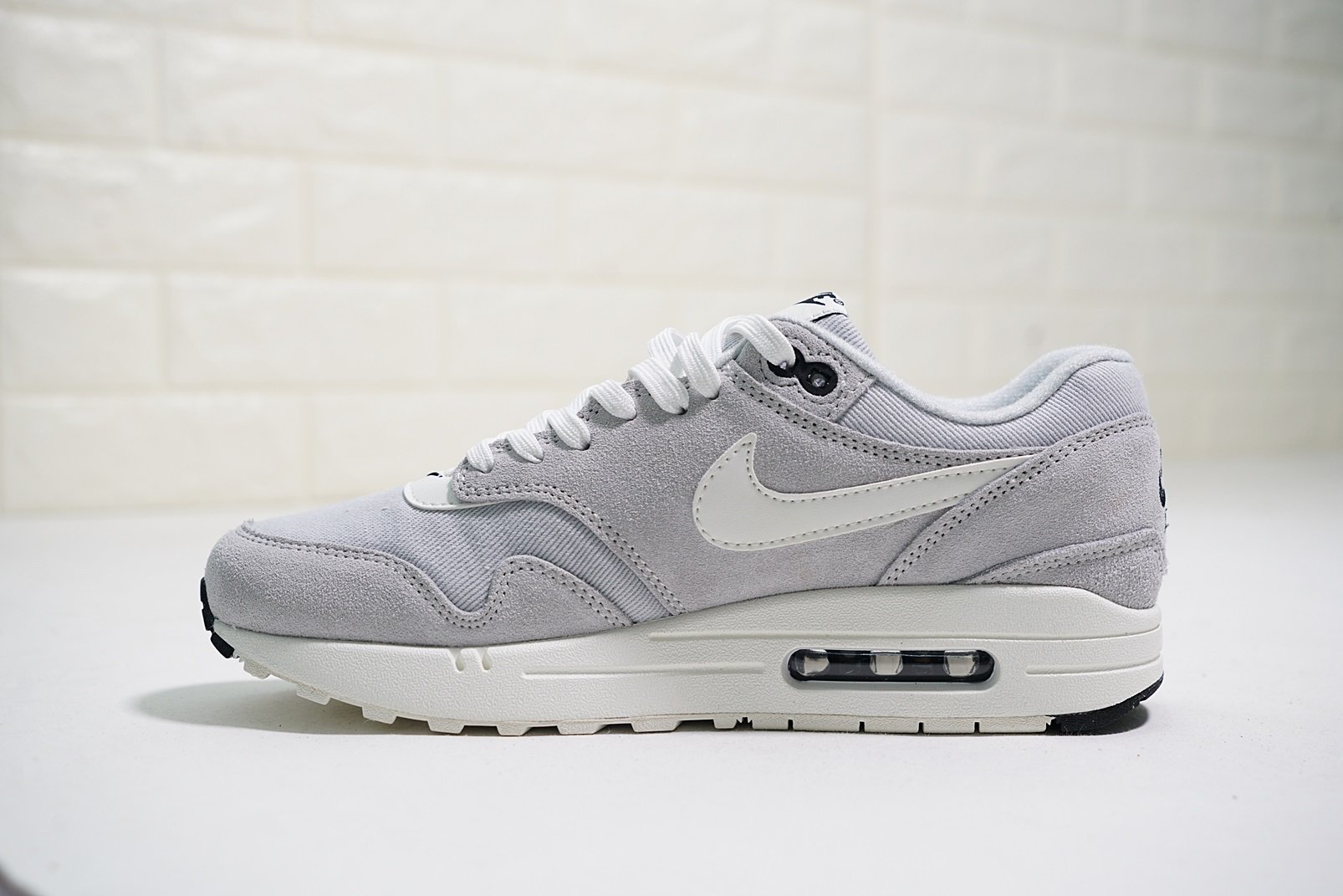 Nike Air Max 1 Mini-Swoosh in Pure Platinum/Sail Grey