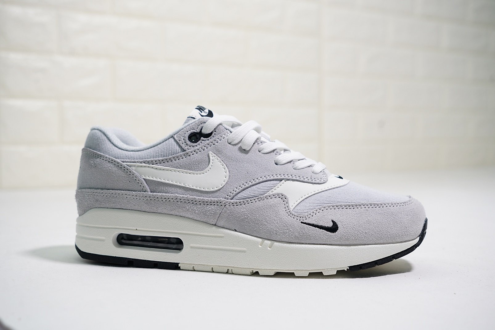 Nike Air Max 1 Mini-Swoosh in Pure Platinum/Sail Grey