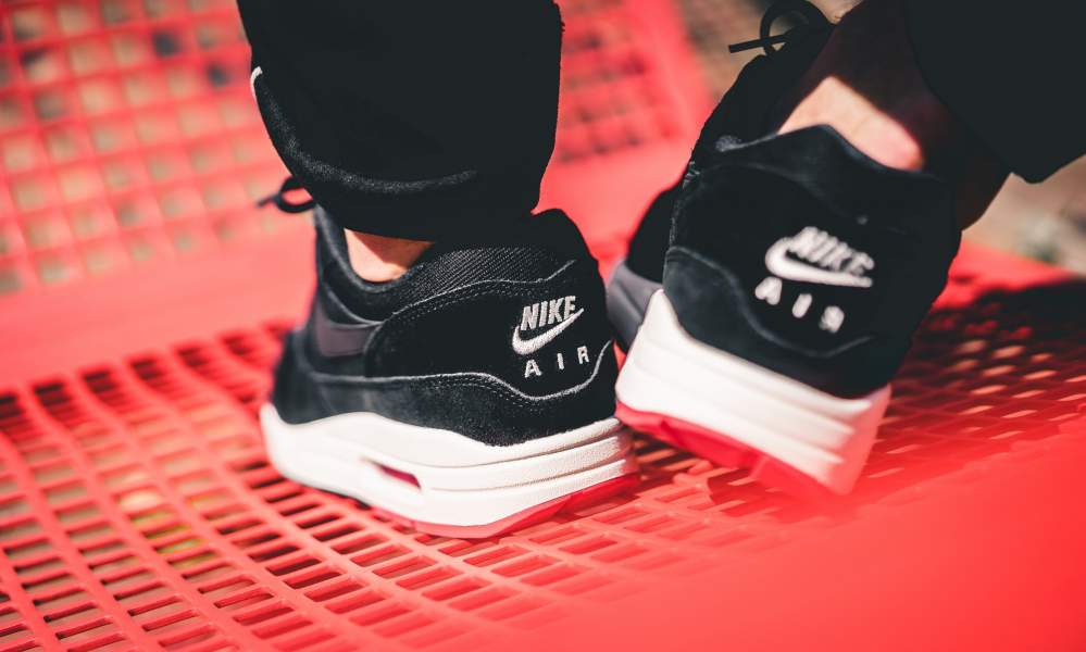 Nike Air Max 1 Premium Bred Mini Swoosh on feet image