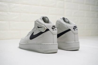 Nike Air Force 1 Mid Light Bone Black Swoosh heel