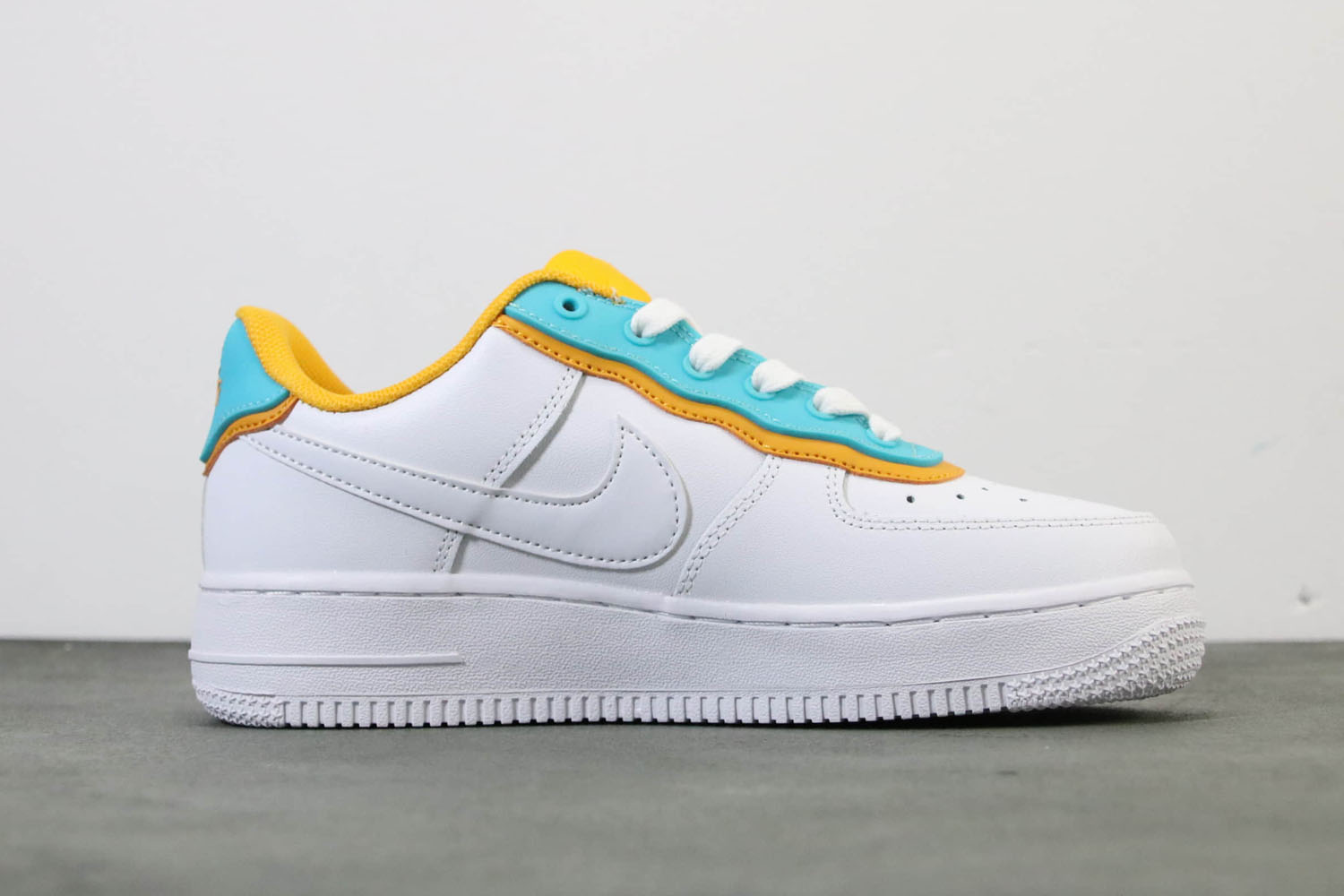 white and sky blue air force ones