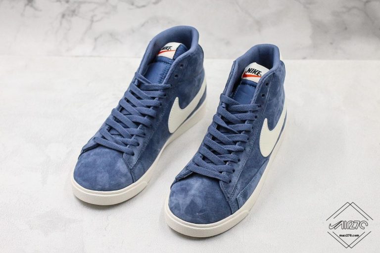 white and navy blue nike blazers