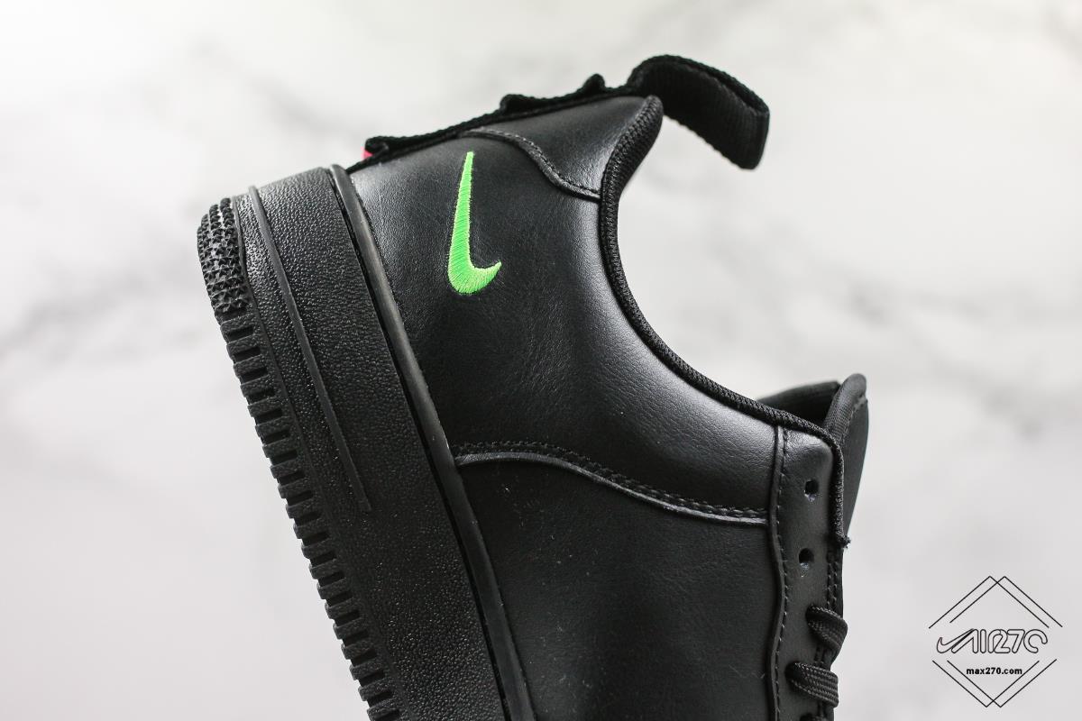 A Neon Green Leather Covers The Nike Air Force 1 Low •