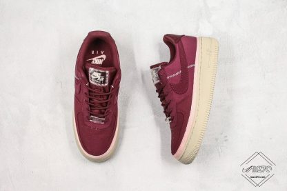 WMNS Air Force 1 SE Night Maroon Coral Dust tongue