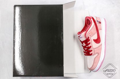 Dunk Low SB x StrangeLove Valentines Day pink swoosh suede