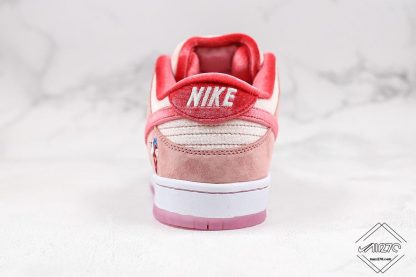 Dunk Low SB x StrangeLove Valentines Day pink swoosh heel