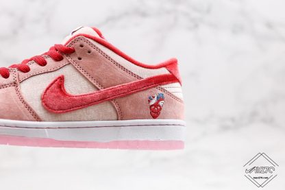 Dunk Low SB x StrangeLove Valentines Day pink swoosh shoes