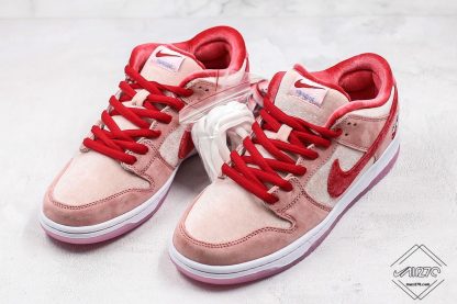 Dunk Low SB x StrangeLove Valentines Day pink swoosh sneaker