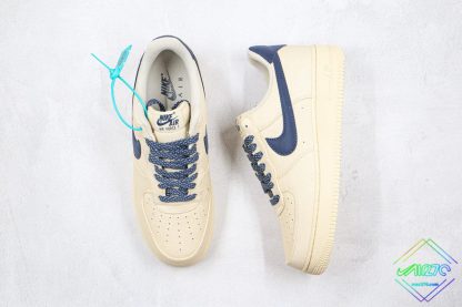 Nike Air Force 1 Low Sail Beige Navy Blue front