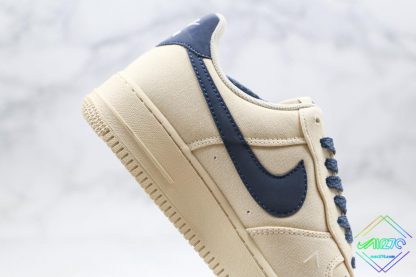 Nike Air Force 1 Low Sail Beige Navy Blue lateral