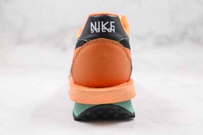 A Bathing APE x Sacai x Nike LDV Waffle Daybreak Orange Green Heel