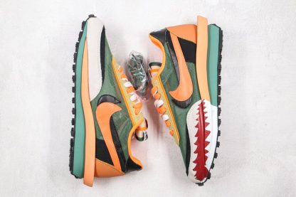 A Bathing APE x Sacai x Nike LDV Waffle Daybreak Orange Green Top