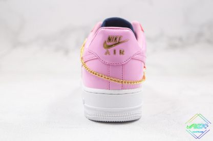 Nike Air Force 1 Cuban Link pink gold heel