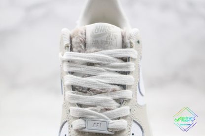 Nike Air Force 1 Low Light Bone Photon Dust tongue