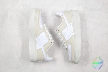 Nike Air Force 1 Low Light Bone Photon Dust white swoosh