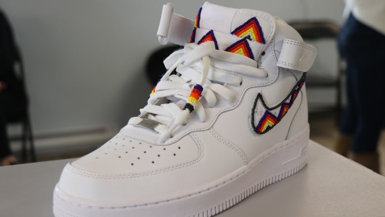 A beaded Air Force One high-top sneaker