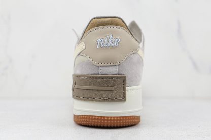 Pale Ivory AF-1 Low Shadow Woodsy heel