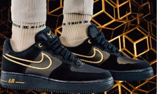 black forces with gold nike sign